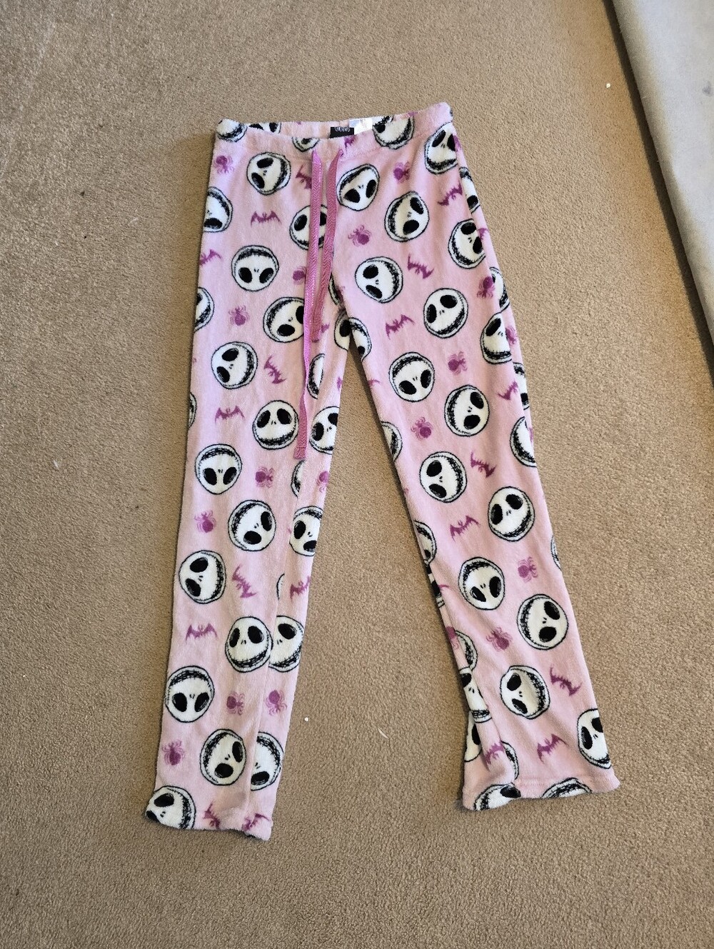 Disney Pink Fleece Pajama Bottoms with Black & White Skull Faces